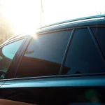 Enhance your vehicle's look with auto window tint near me, featuring premium tinting on a sleek car.