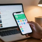 GB WhatsApp app on smartphone showing features and customization in a stylish workspace.